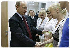 Russian Prime Minister Vladimir Putin on his trip to Nizhny Novgorod met with visitors of the first public reception office of United Russia, which was opened there on Wednesday.|24 july, 2008|22:00