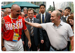 Prime Minister Vladimir Putin met with Russian sportsmen in the Olympic village in Beijing|9 august, 2008|12:00