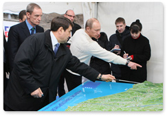 Vladimir Putin and IOC Coordination Commission Chairman Jean-Claude Killy visited a section of the bypass road around Sochi intended to ease traffic in the city during the 2014 Winter Olympics