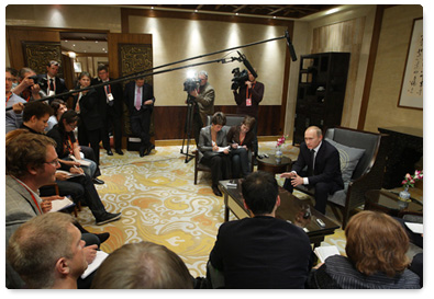 По завершении официального визита в Китай Председатель Правительства Российской Федерации В.В.Путин ответил на вопросы журналистов