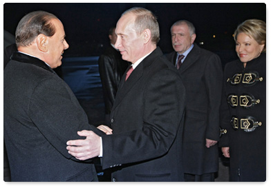 Prime Minister Vladimir Putin arrived in St Petersburg and met with Italian Prime Minister Silvio Berlusconi