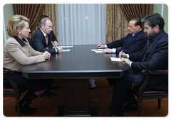 Prime Minister Vladimir Putin and St Petersburg Governor Valentina Matvienko during a meeting with Italian Prime Minister Silvio Berlusconi|21 october, 2009|20:57