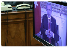 Russian Prime Minister Vladimir Putin and Italian Prime Minister Silvio Berlusconi in a videoconference with their Turkish counterpart Recep Tayyip Erdogan|22 october, 2009|16:34