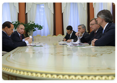 Prime Minister Vladimir Putin and Italian Prime Minister Silvio Berlusconi meeting with Sollers CEO Vadim Shvetsov, KamAZ CEO Sergei Kogogin and Sukhoi CEO Mikhail Pogosyan|22 october, 2009|16:34