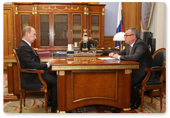 Prime Minister Vladimir Putin during a meeting with Andrei Kostin, President of Vneshtorgbank