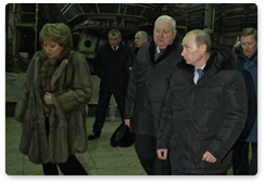 Prime Minister Vladimir Putin inspects diesel electric submarine construction shops at the Admiralty Shipyards in St Petersburg