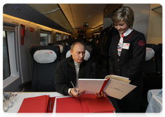 Prime Minister Vladimir Putin returned to Moscow from his trip to St Petersburg on a new high-speed train Sapsan|20 december, 2009|13:35