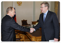 Prime Minister Vladimir Putin during a meeting with Deputy Prime Minister and Finance Minister Alexei Kudrin|26 december, 2009|19:06