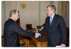 Prime Minister Vladimir Putin meets with Deputy Prime Minister and Finance Minister Alexei Kudrin