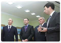 Prime Minister Vladimir Putin being briefed on the first phase results of introducing digital TV broadcasting in the Far East|28 december, 2009|14:36