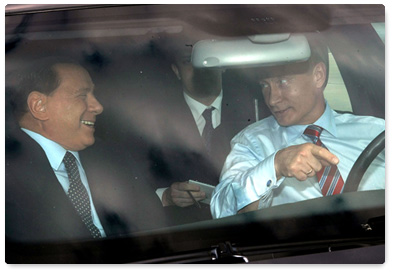 Prime Minister Vladimir Putin meets with his Italian counterpart Silvio Berlusconi in Sochi
