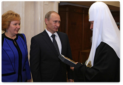 Prime Minister Vladimir Putin with wife Lyudmila arrived at Moscow's Christ the Saviour Cathedral to personally congratulate Patriarch of Moscow and All Russia Kirill on his Name Day