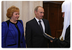 Prime Minister Vladimir Putin with wife Lyudmila arrived at Moscow's Christ the Saviour Cathedral to personally congratulate Patriarch of Moscow and All Russia Kirill on his Name Day