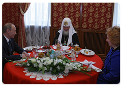 Prime Minister Vladimir Putin with wife Lyudmila arrived at Moscow's Christ the Saviour Cathedral to personally congratulate Russian Orthodox Patriarch Kirill on his Name Day|24 may, 2009|17:27