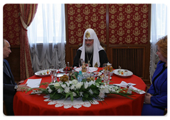 Prime Minister Vladimir Putin with wife Lyudmila arrived at Moscow's Christ the Saviour Cathedral to personally congratulate Russian Orthodox Patriarch Kirill on his Name Day|24 may, 2009|17:27