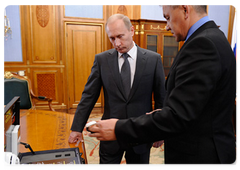 Prime Minister Vladimir Putin meeting with Sergei Shoigu, the Minister of Civil Defence, Emergencies and Disaster Relief|7 may, 2009|16:22