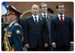 Prime Minister Vladimir Putin, Head of Presidential Executive Office Sergei Naryshkin and President Dmitry Medvedev during the ceremony of laying a wreath at the Tomb of the Unknown Soldier|8 may, 2009|10:00