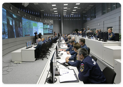 Prime Minister Vladimir Putin chairing a telephone conference on the Sayano-Shushenskaya Hydropower Plant disaster at the National Emergency Management Centre of the Ministry of Civil Defence, Emergencies and Disaster Relief|17 august, 2009|22:18