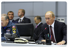 Prime Minister Vladimir Putin chairing a telephone conference on the Sayano-Shushenskaya Hydropower Plant disaster at the National Emergency Management Centre of the Ministry of Civil Defence, Emergencies and Disaster Relief|17 august, 2009|22:18