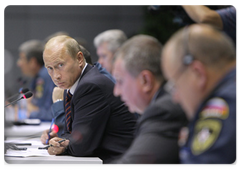 Prime Minister Vladimir Putin chairing a telephone conference on the Sayano-Shushenskaya Hydropower Plant disaster at the National Emergency Management Centre of the Ministry of Civil Defence, Emergencies and Disaster Relief|17 august, 2009|22:18