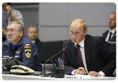 Prime Minister Vladimir Putin chairing a telephone conference on the Sayano-Shushenskaya Hydropower Plant disaster at the National Emergency Management Centre of the Ministry of Civil Defence, Emergencies and Disaster Relief|17 august, 2009|22:18