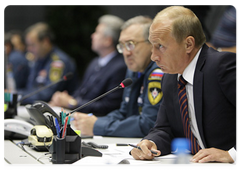 Prime Minister Vladimir Putin chairing a telephone conference on the Sayano-Shushenskaya Hydropower Plant disaster at the National Emergency Management Centre of the Ministry of Civil Defence, Emergencies and Disaster Relief|17 august, 2009|22:18