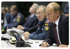 Prime Minister Vladimir Putin chairing a telephone conference on the Sayano-Shushenskaya Hydropower Plant disaster at the National Emergency Management Centre of the Ministry of Civil Defence, Emergencies and Disaster Relief|17 august, 2009|22:18