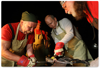 Prime Minister Vladimir Putin visited the ethnographic village of Taltsy on the banks of the Angara River, where he viewed handmade iron crafts by Lake Baikal area’s blacksmiths