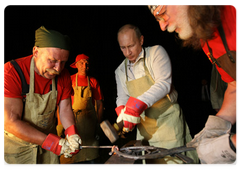 Prime Minister Vladimir Putin visited the ethnographic village of Taltsy on the banks of the Angara River, where he viewed handmade iron crafts by Lake Baikal area’s blacksmiths|2 august, 2009|11:00
