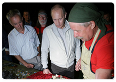 Prime Minister Vladimir Putin visited the ethnographic village of Taltsy on the banks of the Angara River, where he viewed handmade iron crafts by Lake Baikal area’s blacksmiths|2 august, 2009|11:03