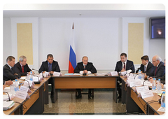 Prime Minister Vladimir Putin during a meeting on relief efforts following the accident at the Sayano-Shushenskaya hydropower plant|21 august, 2009|11:36