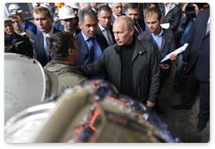 В.В.Путин, прибывший с рабочей поездкой в Республику Хакасия, посетил Саяно-Шушенскую ГЭС