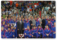 Prime Minister Vladimir Putin conferred state decorations on members of the Russian ice hockey team