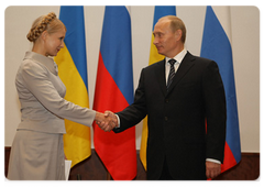 Prime Minister Vladimir Putin with Ukrainian Prime Minister Yulia Tymoshenko during his visit to Poland|1 september, 2009|14:31