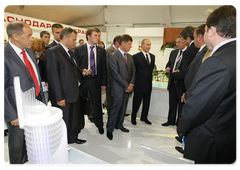 Russian Prime Minister Vladimir Putin visiting an exhibition of development plans for the constituent entities of the Russian Federation as part of his participation in the Sochi International Investment Forum|18 september, 2009|15:50