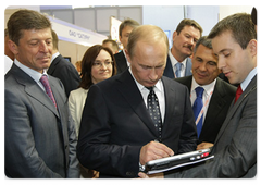 Russian Prime Minister Vladimir Putin visiting an exhibition of development plans for the constituent entities of the Russian Federation as part of his participation in the Sochi International Investment Forum|18 september, 2009|16:21