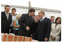 Russian Prime Minister Vladimir Putin visiting an exhibition of development plans for the constituent entities of the Russian Federation as part of his participation in the Sochi International Investment Forum|18 september, 2009|16:29