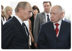 Russian Prime Minister Vladimir Putin visiting an exhibition of development plans for the constituent entities of the Russian Federation as part of his participation in the Sochi International Investment Forum|18 september, 2009|16:29