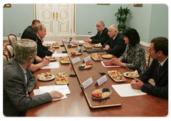 Prime Minister Vladimir Putin with leaders of Dagestan and local militia veterans ten years after international terrorists attacked the North Caucasus republic|25 september, 2009|11:42