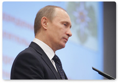 Prime Minister Vladimir Putin makes a speech at a nationwide meeting of the Emergencies Ministry