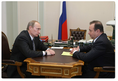 Prime Minister Vladimir Putin holding a working meeting with Vladimir Strzhalkovsky, director general and chairman of the board of Norilsk Nickel