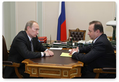 Prime Minister Vladimir Putin holding a working meeting with Vladimir Strzhalkovsky, director general and chairman of the board of Norilsk Nickel