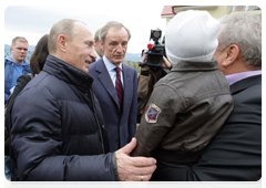 Prime Minister Vladimir Putin in the village of Nekrasovskoye, near Sochi, where people are being rehoused who have been displaced from the Imereti Valley to make way for the 2014 Olympic facilities|13 october, 2010|17:51