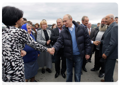 Prime Minister Vladimir Putin in the village of Nekrasovskoye, near Sochi, where people are being rehoused who have been displaced from the Imereti Valley to make way for the 2014 Olympic facilities|13 october, 2010|17:51