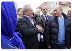 Prime Minister Vladimir Putin in the village of Nekrasovskoye, near Sochi, where people are being rehoused who have been displaced from the Imereti Valley to make way for the 2014 Olympic facilities|13 october, 2010|17:51