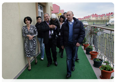 Prime Minister Vladimir Putin in the village of Nekrasovskoye, near Sochi, where people are being rehoused who have been displaced from the Imereti Valley to make way for the 2014 Olympic facilities|13 october, 2010|17:51