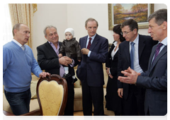 Prime Minister Vladimir Putin in the village of Nekrasovskoye, near Sochi, where people are being rehoused who have been displaced from the Imereti Valley to make way for the 2014 Olympic facilities|13 october, 2010|17:51