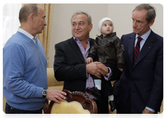 Prime Minister Vladimir Putin in the village of Nekrasovskoye, near Sochi, where people are being rehoused who have been displaced from the Imereti Valley to make way for the 2014 Olympic facilities|13 october, 2010|17:51