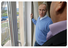 Prime Minister Vladimir Putin in the village of Nekrasovskoye, near Sochi, where people are being rehoused who have been displaced from the Imereti Valley to make way for the 2014 Olympic facilities|13 october, 2010|17:51