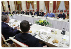 Vladimir Putin has dinner meeting with members  of the IOC's Coordination Commission for the Sochi 2014 Olympic Winter Games